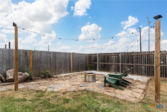1332 Lakeway Crossing Dr, Temple, TX 76502 - fenced backyard with an outdoor fire pit