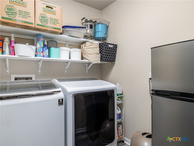 900 Hatton Hill Ln, Austin, TX 78725 - laundry room featuring washer and dryer