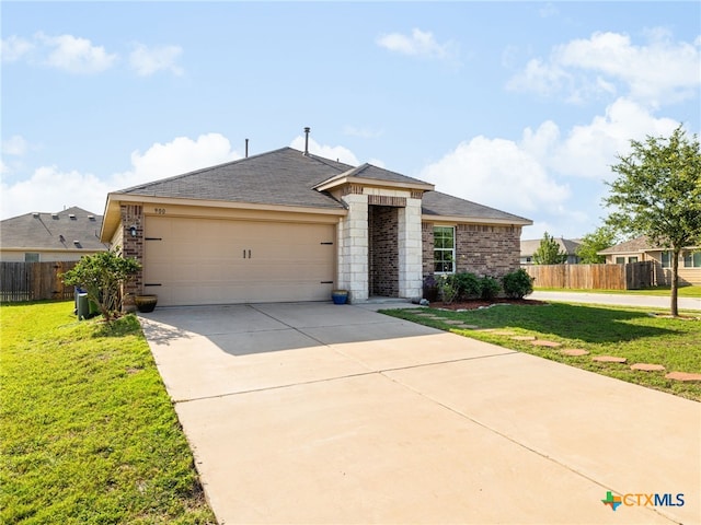 900 Hatton Hill Ln, Austin, TX 78725 - ranch-style home featuring an attached garage, concrete driveway, and brick siding