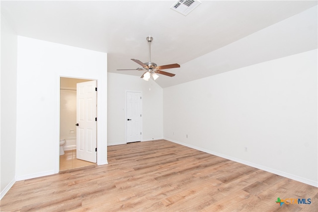 interior space with ceiling fan, light wood-type flooring, and lofted ceiling