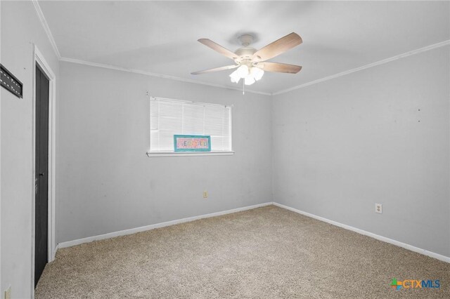 313 Pheasant Dr, Victoria, TX 77905 - carpeted empty room featuring a ceiling fan, ornamental molding, and baseboards