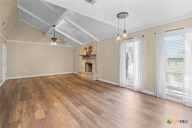 313 Pheasant Dr, Victoria, TX 77905 - unfurnished living room featuring wood finished floors, a large fireplace, baseboards, and ceiling fan