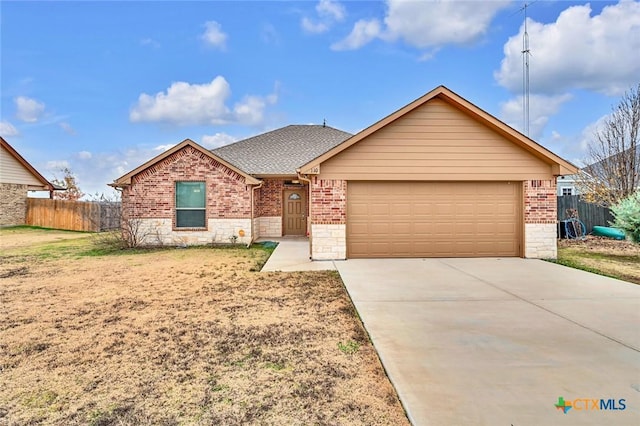 single story home with a garage