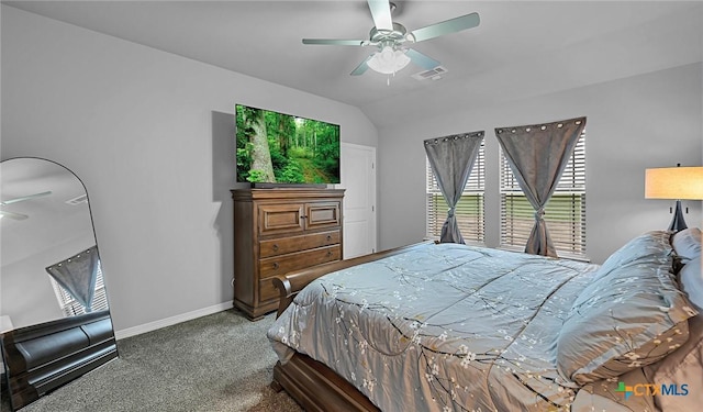 carpeted bedroom featuring vaulted ceiling and ceiling fan