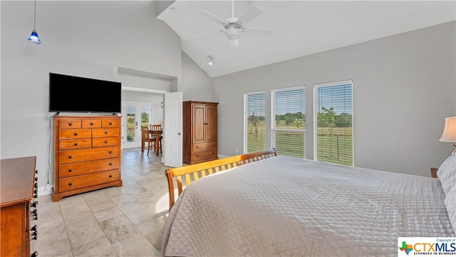 bedroom with high vaulted ceiling, multiple windows, and ceiling fan