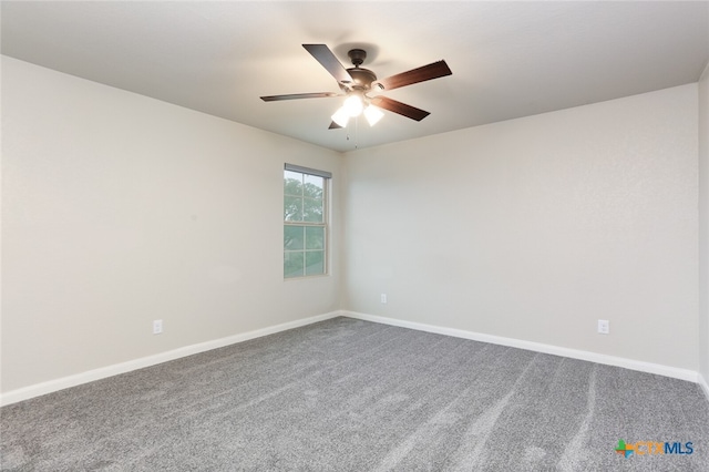 carpeted empty room with ceiling fan