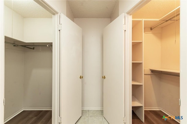 5111 Anacacho St, San Antonio, TX 78217 - spacious closet with wood finished floors