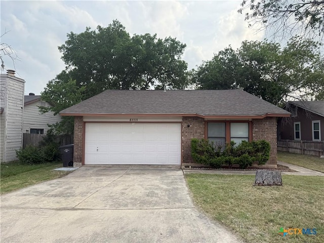 5111 Anacacho St, San Antonio, TX 78217 - view of front of property with brick siding, concrete driveway, an attached garage, and a shingled roof