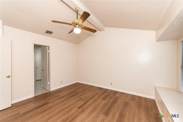 5111 Anacacho St, San Antonio, TX 78217 - unfurnished bedroom with wood finished floors, a textured ceiling, baseboards, and a ceiling fan