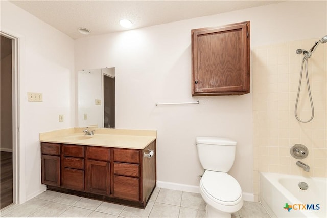 5111 Anacacho St, San Antonio, TX 78217 - full bath featuring toilet, vanity,  shower combination, baseboards, and tile patterned floors