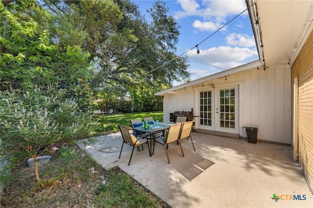 2105 S 49th St, Temple, TX 76504 - view of patio featuring french doors