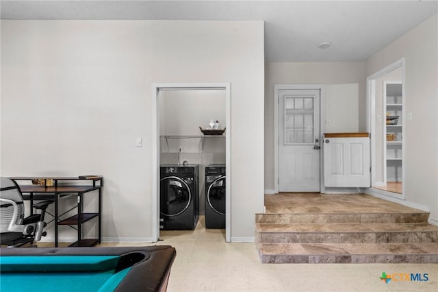 2105 S 49th St, Temple, TX 76504 - laundry room featuring washing machine and dryer and baseboards
