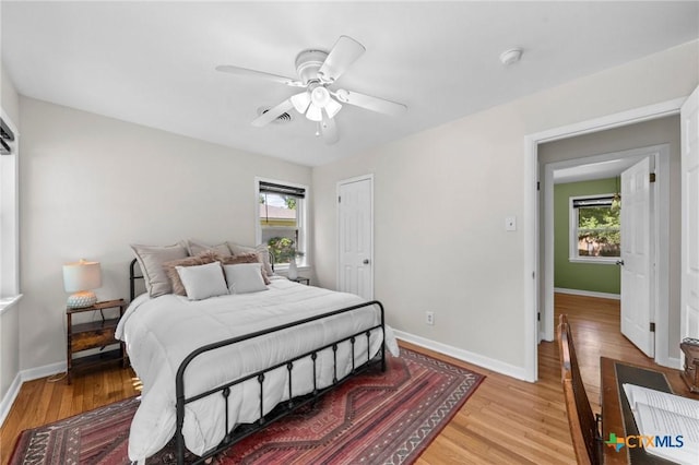 2105 S 49th St, Temple, TX 76504 - bedroom featuring light wood finished floors, baseboards, and a ceiling fan