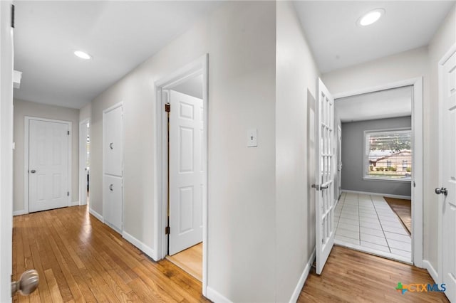 2105 S 49th St, Temple, TX 76504 - corridor featuring light wood-style flooring, recessed lighting, and baseboards