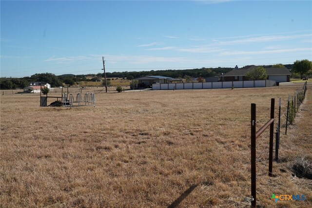 view of yard featuring a rural view