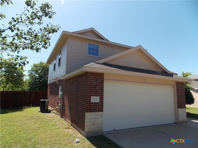 513 Pumpkin Dr, Temple, TX 76502 - view of property exterior featuring brick siding, concrete driveway, and an attached garage