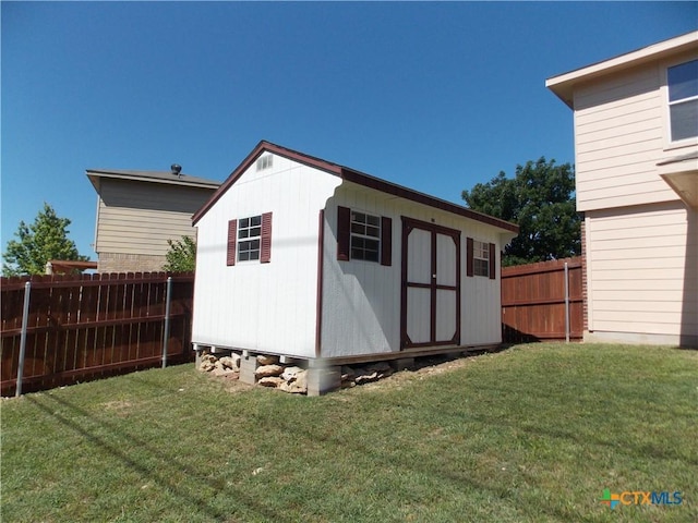 513 Pumpkin Dr, Temple, TX 76502 - view of shed featuring a fenced backyard