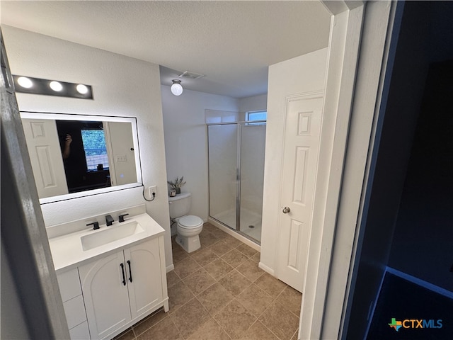 513 Pumpkin Dr, Temple, TX 76502 - full bath with vanity, a shower stall, and a textured ceiling