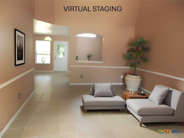 513 Pumpkin Dr, Temple, TX 76502 - sitting room featuring baseboards and a high ceiling
