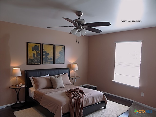 513 Pumpkin Dr, Temple, TX 76502 - bedroom featuring multiple windows, wood finished floors, and a ceiling fan