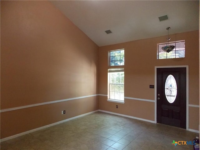 513 Pumpkin Dr, Temple, TX 76502 - foyer entrance with plenty of natural light, high vaulted ceiling, and tile patterned floors