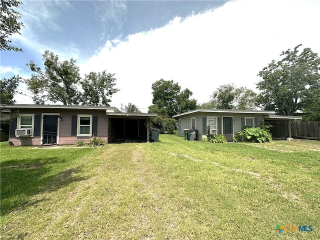 3703 Billy Dr, Victoria, TX 77901 - view of yard with an attached carport and cooling unit