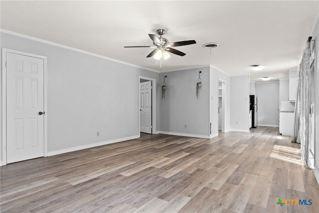 unfurnished room with light wood-type flooring, ceiling fan, and crown molding