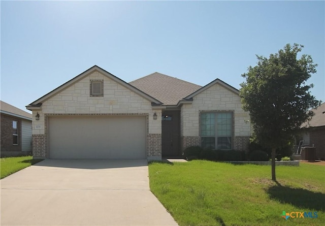 6108 Worthing Dr, Temple, TX 76502 - view of front of house with brick siding, a front lawn, an attached garage, driveway, and central AC unit