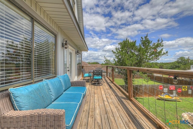 1568 Blueridge Dr, Canyon Lake, TX 78133 - wooden terrace with outdoor lounge area and outdoor dining space
