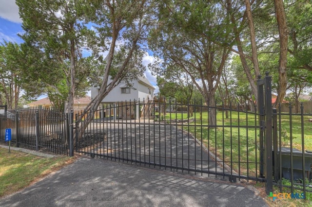 1568 Blueridge Dr, Canyon Lake, TX 78133 - gate featuring a fenced front yard