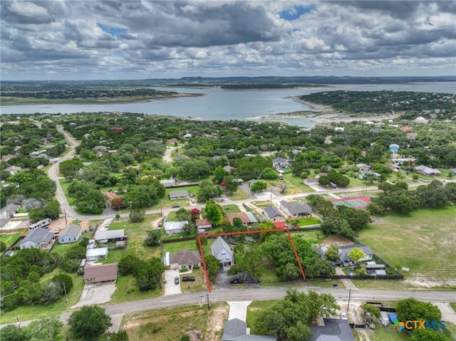 1568 Blueridge Dr, Canyon Lake, TX 78133 - aerial perspective of suburban area with a large body of water and property parcel outlined