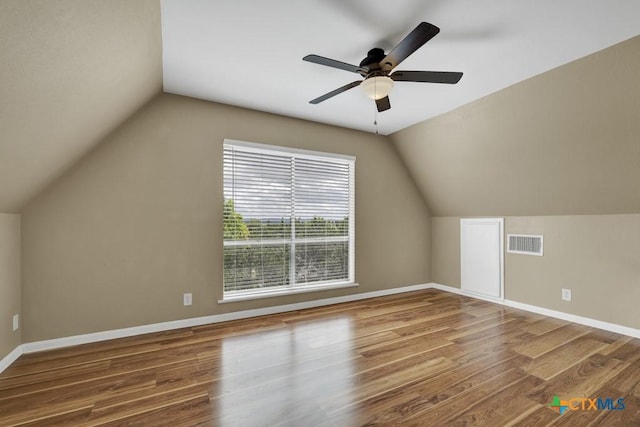 1568 Blueridge Dr, Canyon Lake, TX 78133 - additional living space with wood finished floors, lofted ceiling, and a ceiling fan