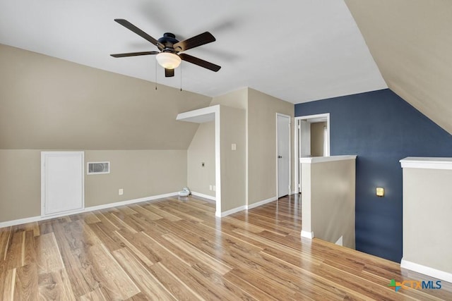 1568 Blueridge Dr, Canyon Lake, TX 78133 - additional living space featuring a ceiling fan, lofted ceiling, and light wood-style flooring