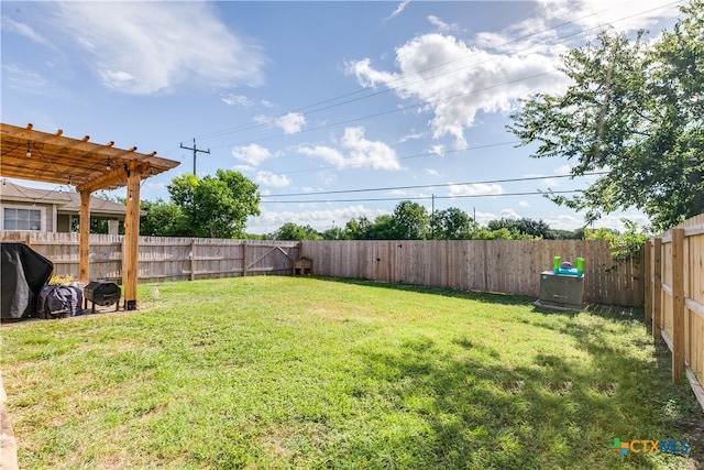 view of yard with a pergola