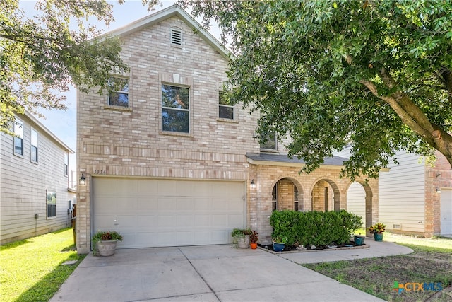 front of property featuring a garage