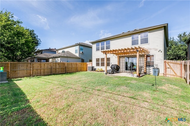 rear view of property featuring a lawn, cooling unit, a patio, and a pergola