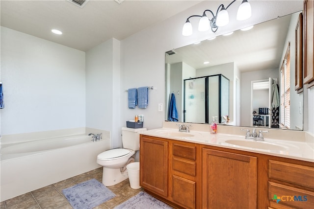 full bathroom with tile patterned flooring, vanity, toilet, and separate shower and tub