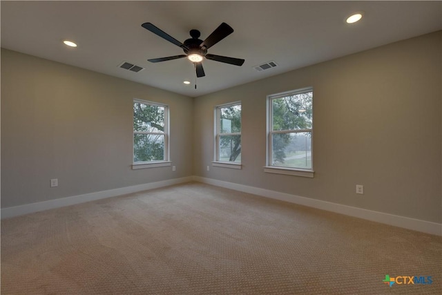 701 S Hudson St, Flatonia, TX 78941 - empty room featuring baseboards, recessed lighting, light colored carpet, and ceiling fan
