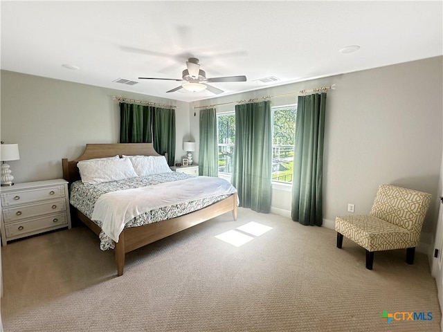 701 S Hudson St, Flatonia, TX 78941 - bedroom with carpet flooring, ceiling fan, and baseboards
