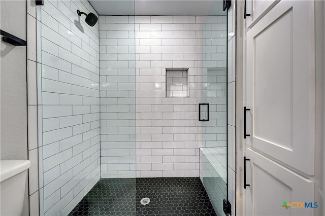701 S Hudson St, Flatonia, TX 78941 - bathroom with a shower stall and toilet
