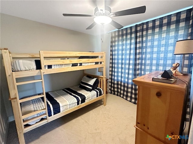 701 S Hudson St, Flatonia, TX 78941 - carpeted bedroom with a ceiling fan