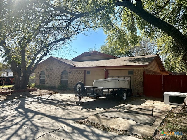 view of property exterior featuring a garage