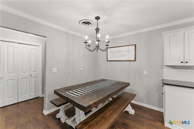 dining space featuring crown molding, baseboards, a chandelier, and dark wood-style floors