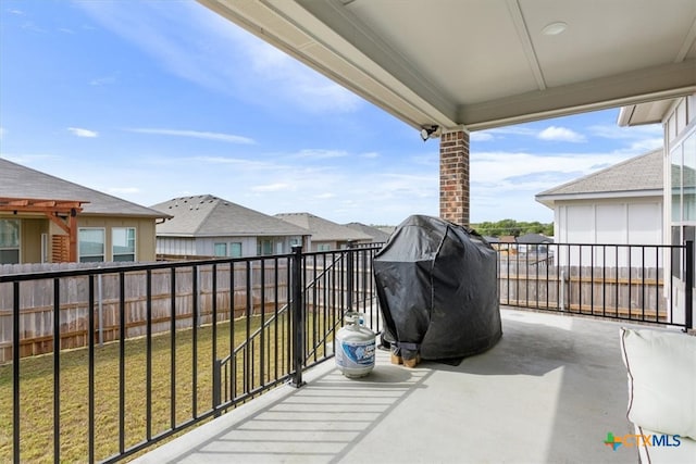 balcony featuring a patio and grilling area