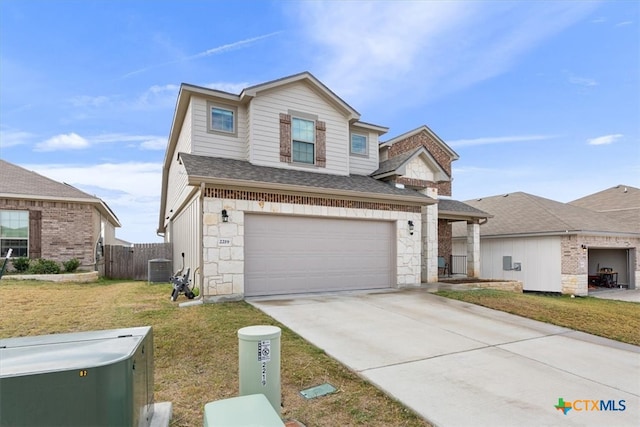 view of front property featuring a garage, central AC unit, and a front lawn