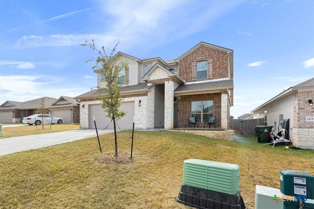 view of front of home with a front lawn and a garage