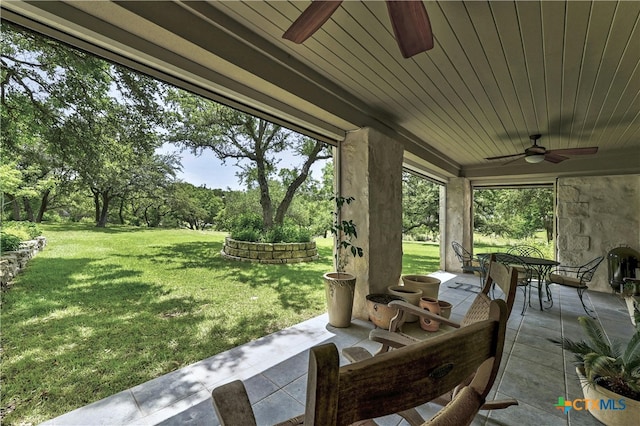 view of patio with ceiling fan