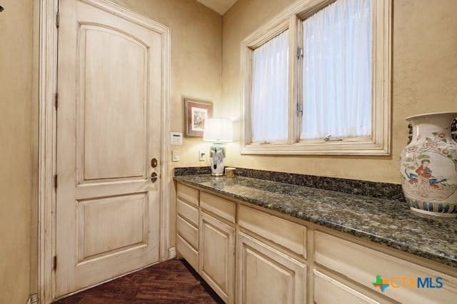 bathroom featuring vanity and hardwood / wood-style flooring