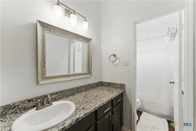320 Meadow Park, New Braunfels, TX 78130 - bathroom with vanity, toilet, and a shower with shower curtain