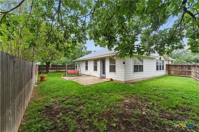 rear view of house featuring a patio area